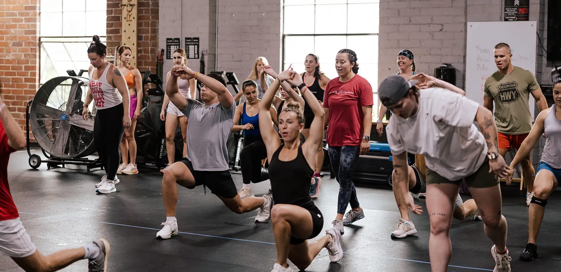 Large group workout class at CrossFit Liberate fitness gym